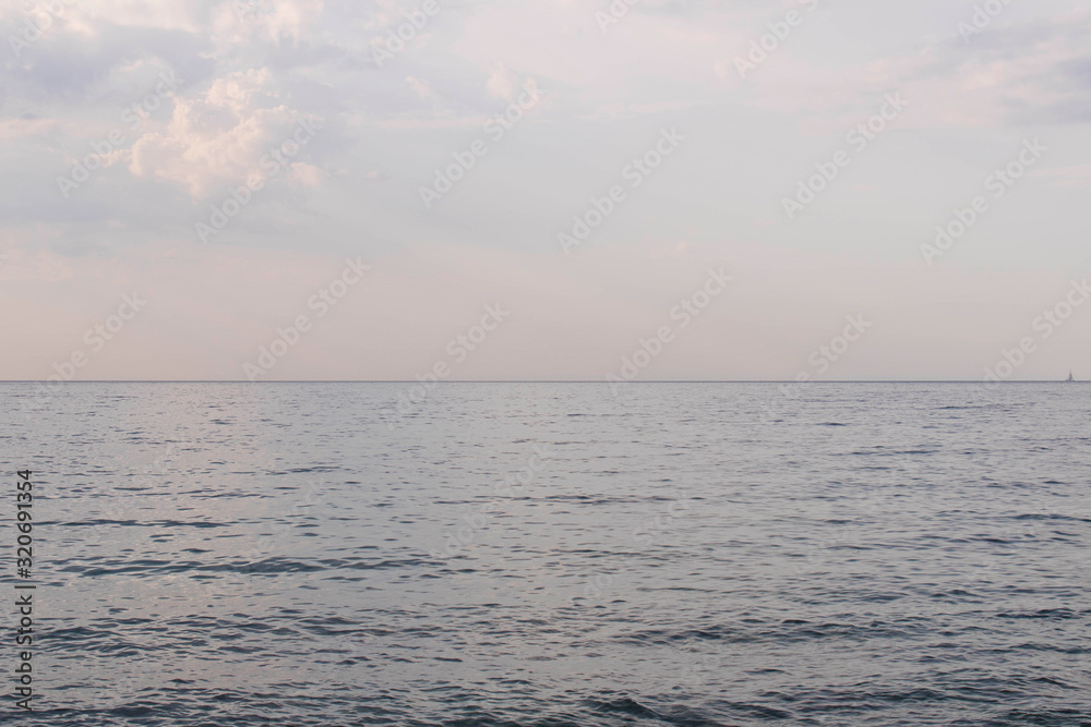 Sea with clouds in cloudy weather. Infinite horizon. Sea with clouds in cloudy weather. Infinite horizon.