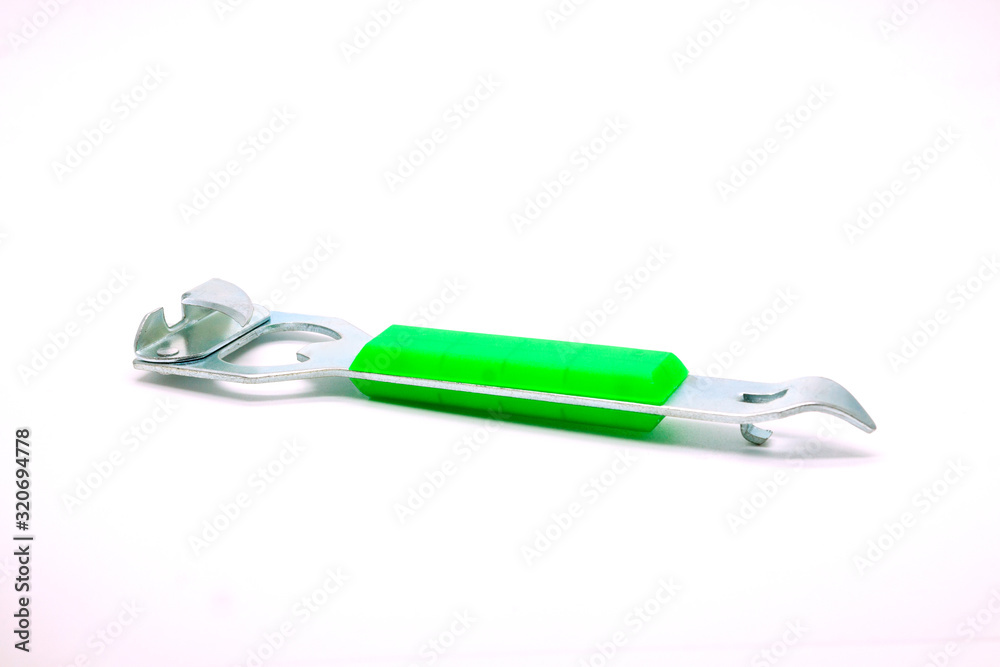 Bottle opener on a white background,selective focus Bottle opener on a white background,selective focus