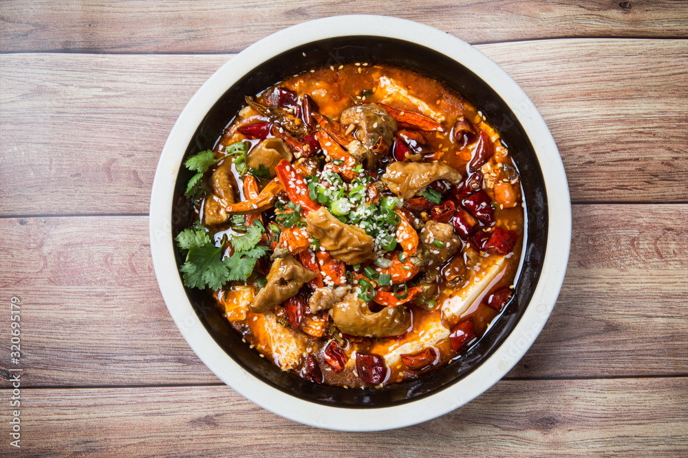 This is a famous hot pot dish in Chengdu, Sichuan Province, China. It's made of all kinds of meat and peppers. It's spicy but delicious This is a famous hot pot dish in Chengdu, Sichuan Province, China. It's made of all kinds of meat and peppers. It's spicy but delicious