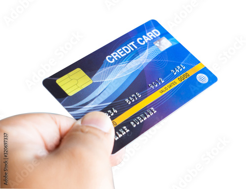 male hand holding a bank card isolated on white background with clipping path.