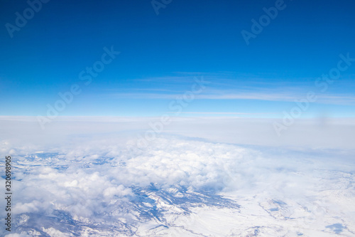 White clouds isolated on the blue sky View from the above