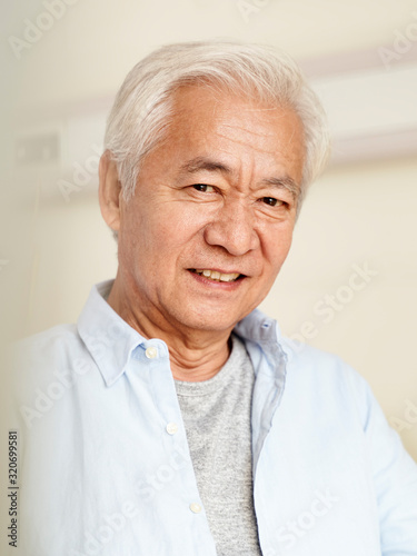 portrait of happy asian senior man