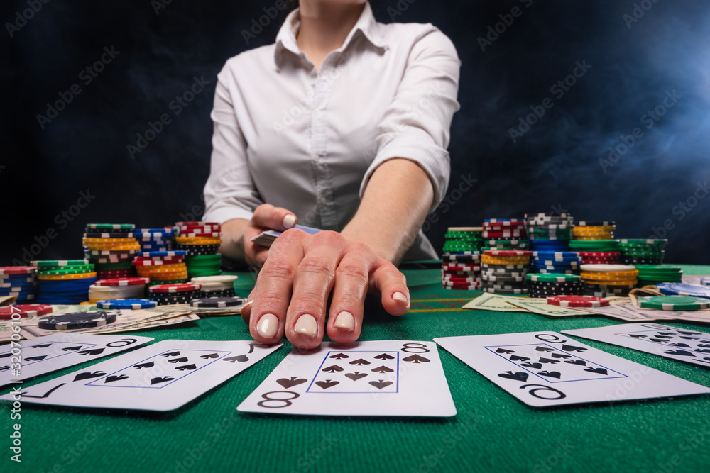 A screen saver for advertising casinos and gambling. A croupier girl or dealer distributes cards for playing poker