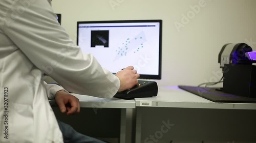 Wallpaper Mural Quality engineer scanning some moldings by professional optical 3D scanner with a turntable, metrology concept Torontodigital.ca