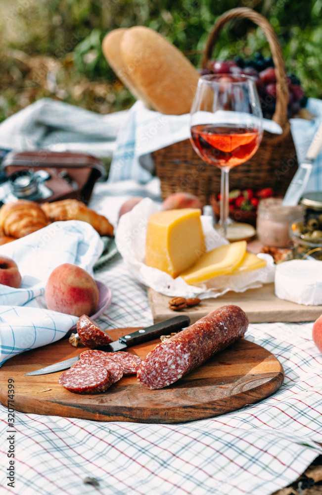 Sliced salami on a provencal style picnic