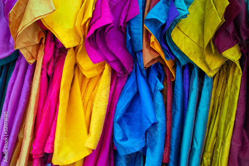Colourful silk shirts on rack in Little India