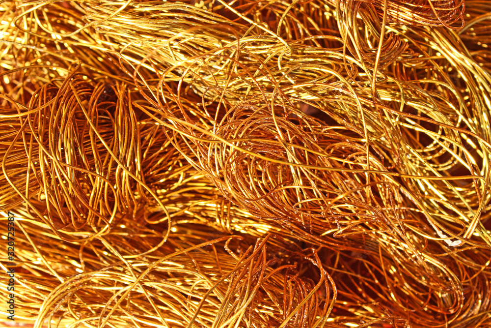 The texture of a heap of copper wire. Conductive metal electrical cable