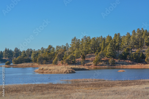 Peaceful view of Fool Hollow Lake in Show Low, Navajo County, Apache Sitgreaves National Forest, Arizona USA photo