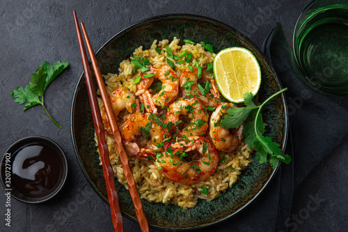 fried rice and prawn in  bowl