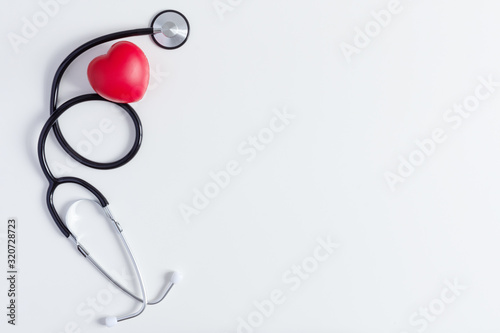 Doctor's stethoscope with red heart. Healthcare medical concept. photo
