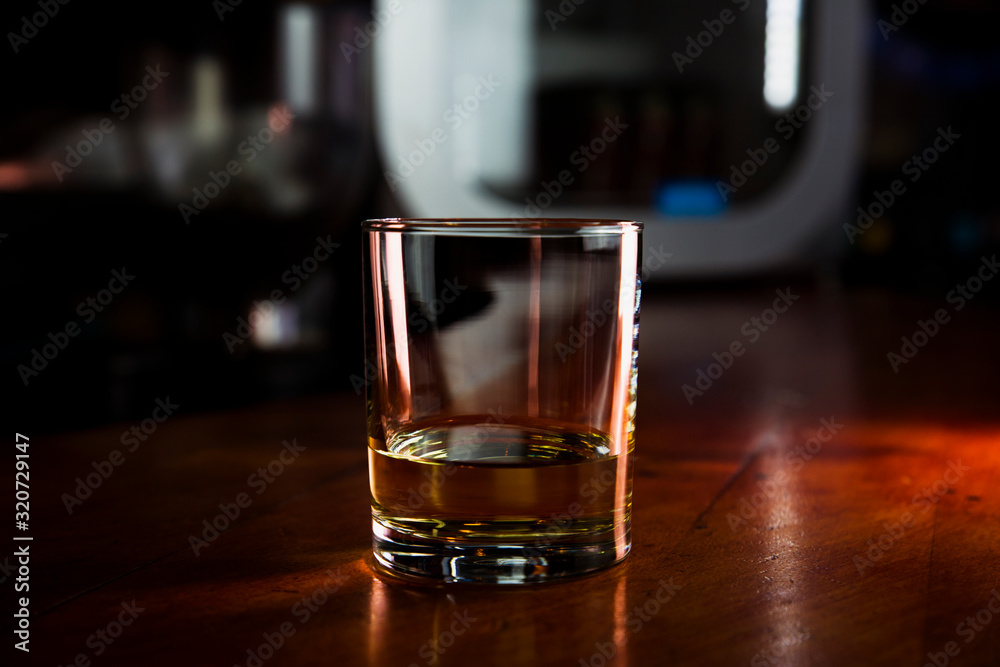 Whiskey Served in a Bar On a Rustic Wooden Surface