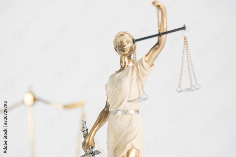 Statue of Themis on a white background, justice Statue of Themis on a white background, justice