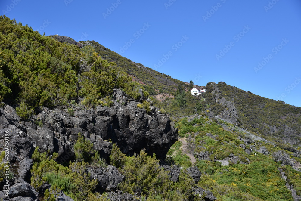 Landscape of green mountains of Madeira Island - view from the trial to Pico Ruivo. Landscape of green mountains of Madeira Island - view from the trial to Pico Ruivo.
