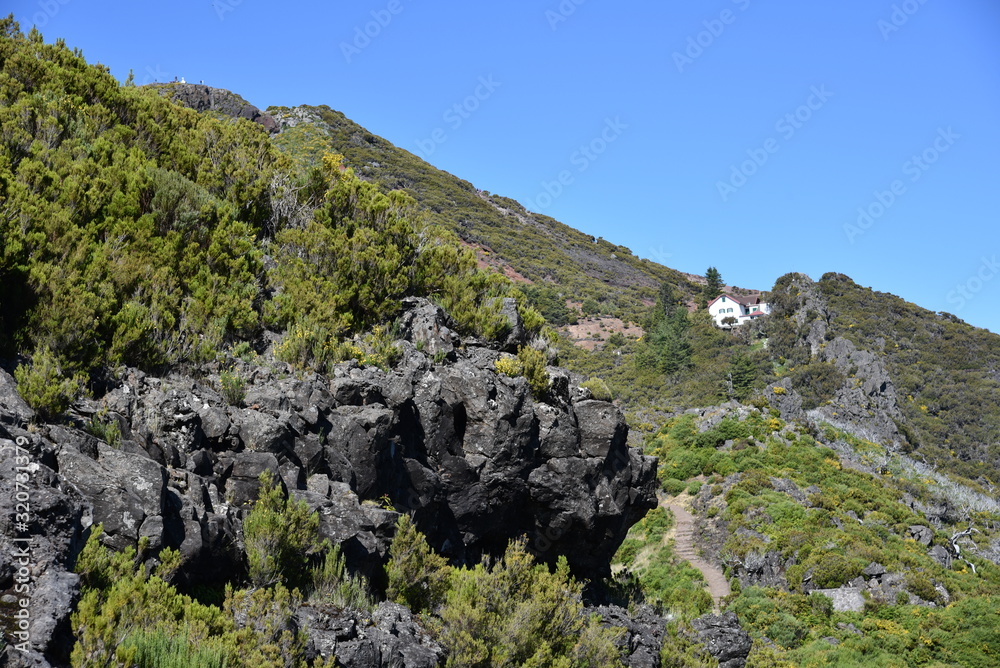 Landscape of green mountains of Madeira Island - view from the trial to Pico Ruivo. Landscape of green mountains of Madeira Island - view from the trial to Pico Ruivo.