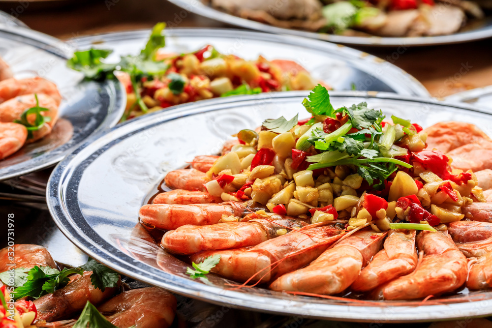 Delicious chinese food poached shrimp,ingredients are coriander and garlic with chili. Delicious chinese food poached shrimp,ingredients are coriander and garlic with chili.