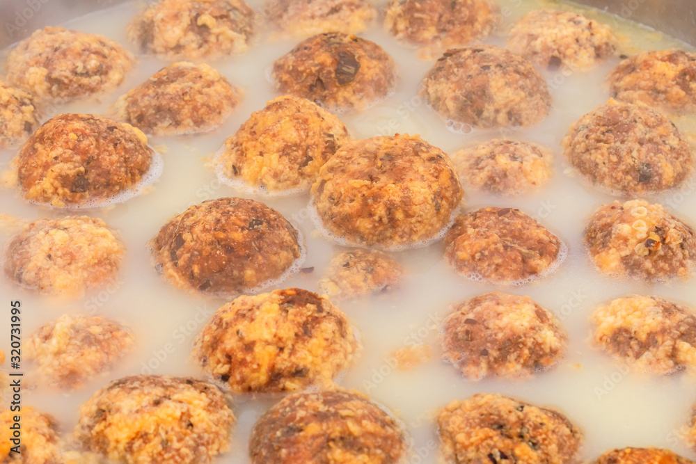 Cooked deep-fried meatballs made from cooked pork and cooked rice.Chinese food. Cooked deep-fried meatballs made from cooked pork and cooked rice.Chinese food.
