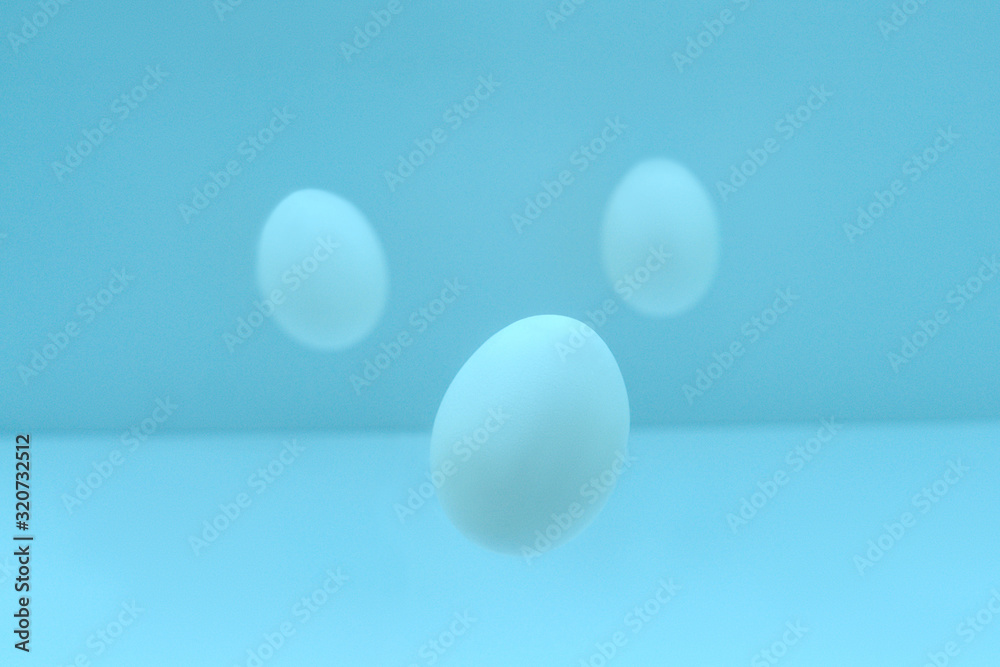 Flying easter eggs on light background. Flying easter eggs on light background.