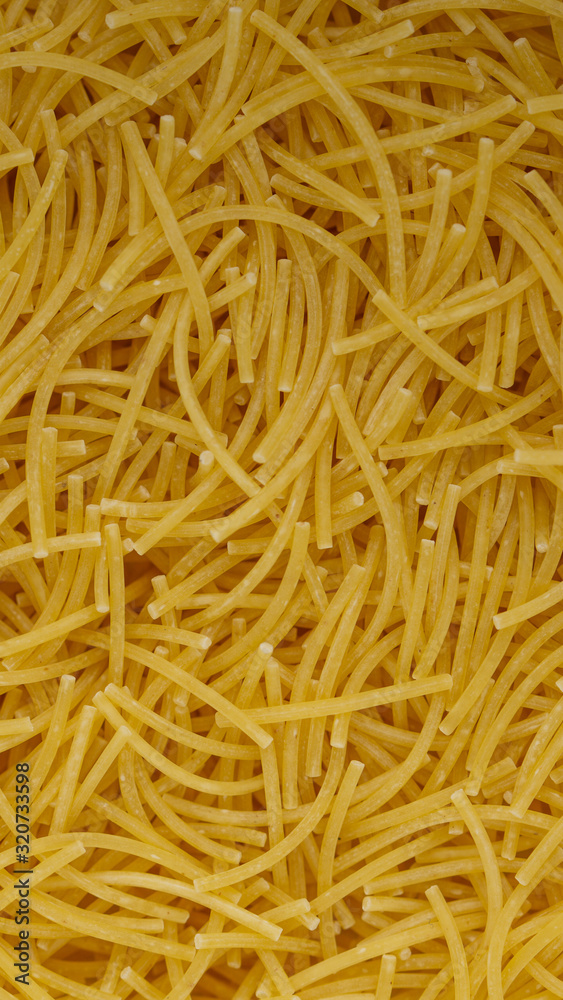Italian noodles pasta full frame. Closeup, macro photo Italian noodles pasta full frame. Closeup, macro photo