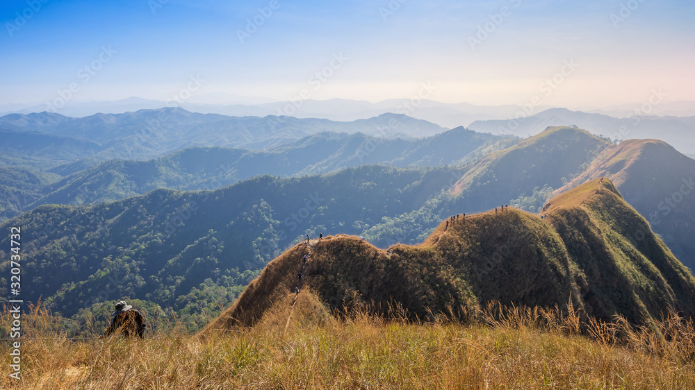 Naklejka premium beautiful mountain in sunset at Thong Pha Phum National Park Kanchanaburi of Thailand name Khao Chang Phuak