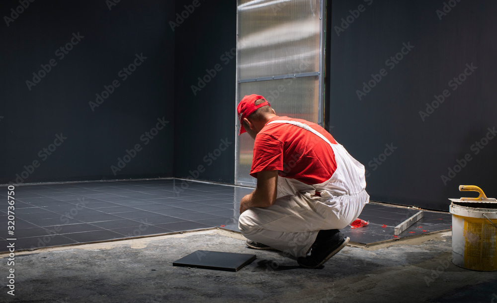 Floor ceramic tiles installation. Create, arranging. Floor ceramic tiles installation. Create, arranging.