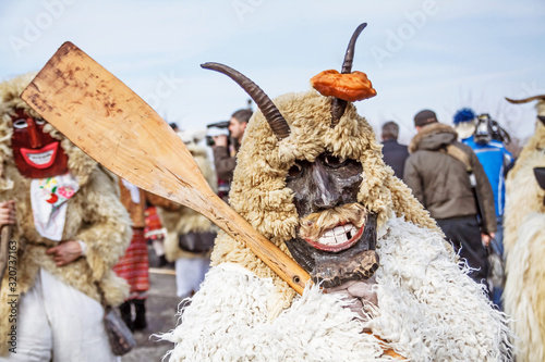 Unidentified people in masks; participants at the Mohacsi Busojaras, it is a carnival for spring greetings (Intangible Cultural Heritage of Humanity of the UNESCO).