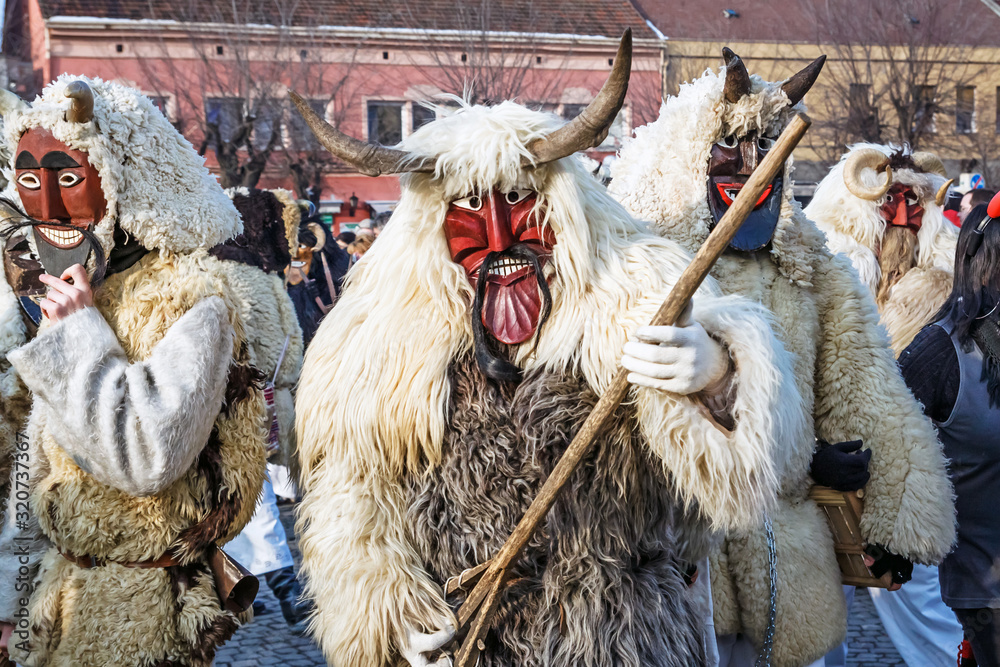Unidentified people in masks; participants at the Mohacsi Busojaras, it is a carnival for spring greetings (Intangible Cultural Heritage of Humanity of the UNESCO).