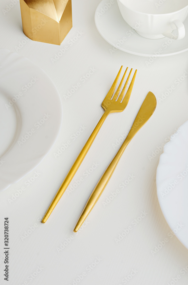 Modern trendy matte gold appliances - fork and knife
