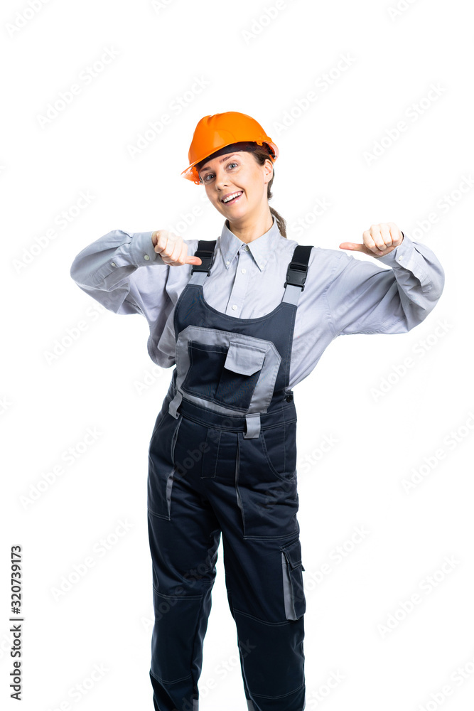 Female construction engineer shows with hand gestures that we are the best. Isolated