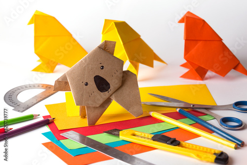 Photography origami bird made of colored paper