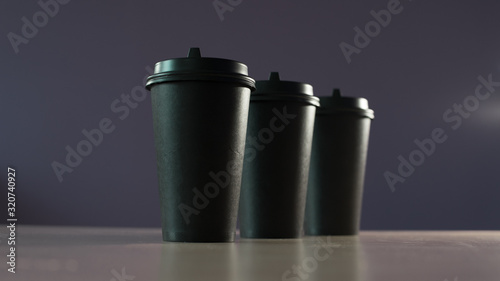 Three black cups of coffee. Coffee cup. 