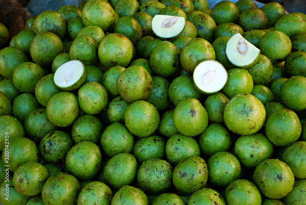 Raw Mangoes, beautifully decorated in New Market, Bhopal, Madhya Pradesh, India..