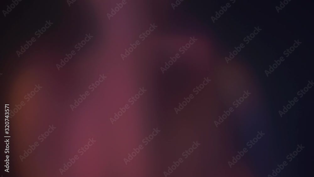 Woman silhouette through the misted glass in bokeh Woman silhouette through the misted glass in bokeh