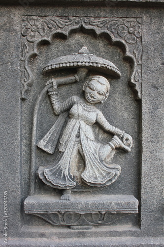 Sculpture a lady. Shiva temple. Ahilyabai Holkar fort. Maheswar, Khargone, Madhya Pradesh, India photo