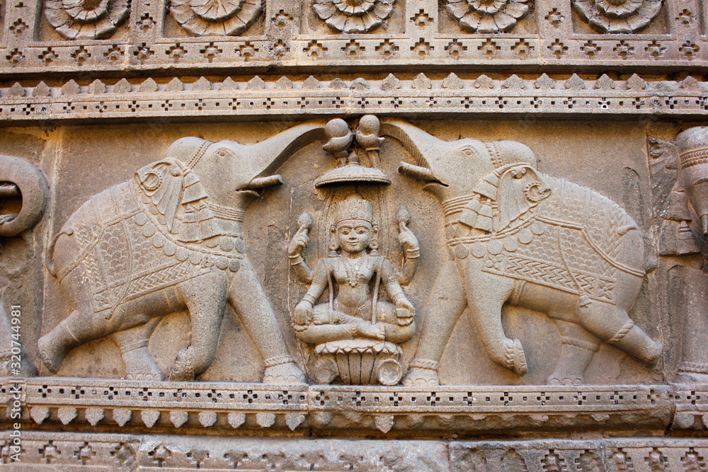 Carved design on the outer walls of Shiva temple. Ahilyabai Holkar fort, Maheswar, Khargone, Madhya Pradesh, India