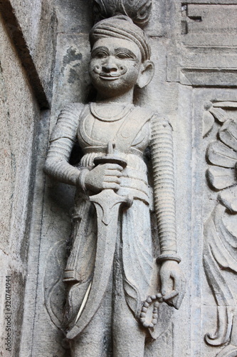 Sculpture on the outer walls of Shiva temple. Ahilyabai Holkar fort, Maheswar, Khargone, Madhya Pradesh, India photo