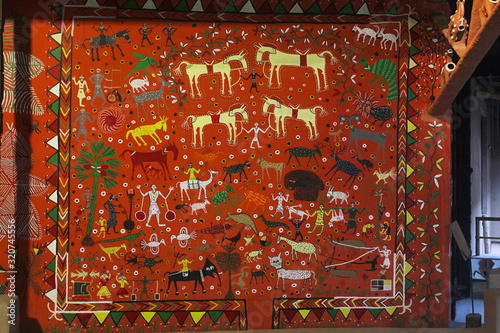 Designed wall of a tribal house. Sahariya tribe. India photo