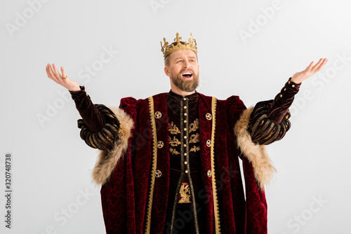 Canvas Print handsome king with crown screaming isolated on grey