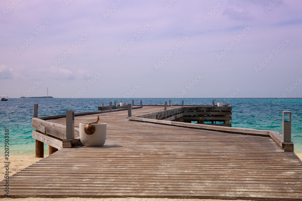 wooden bridge in the Maldives, goes out to sea