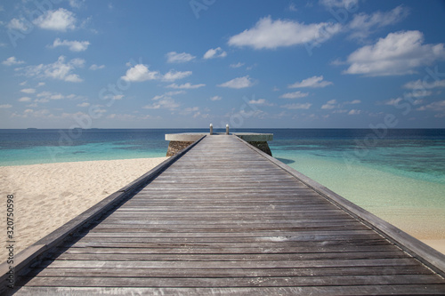 pier overlooking the sea, wooden bridge on one of the islands in the Maldives