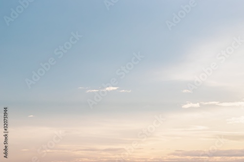 Sky background. Calm beautiful pastel sky with small clouds