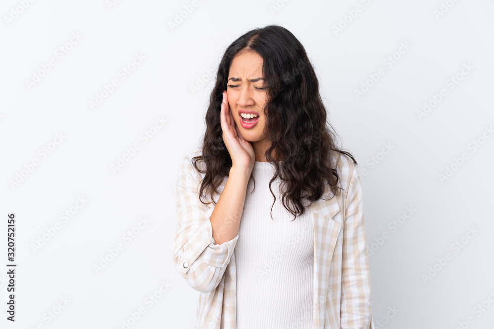 Mixed race woman over isolated white background with toothache Mixed race woman over isolated white background with toothache