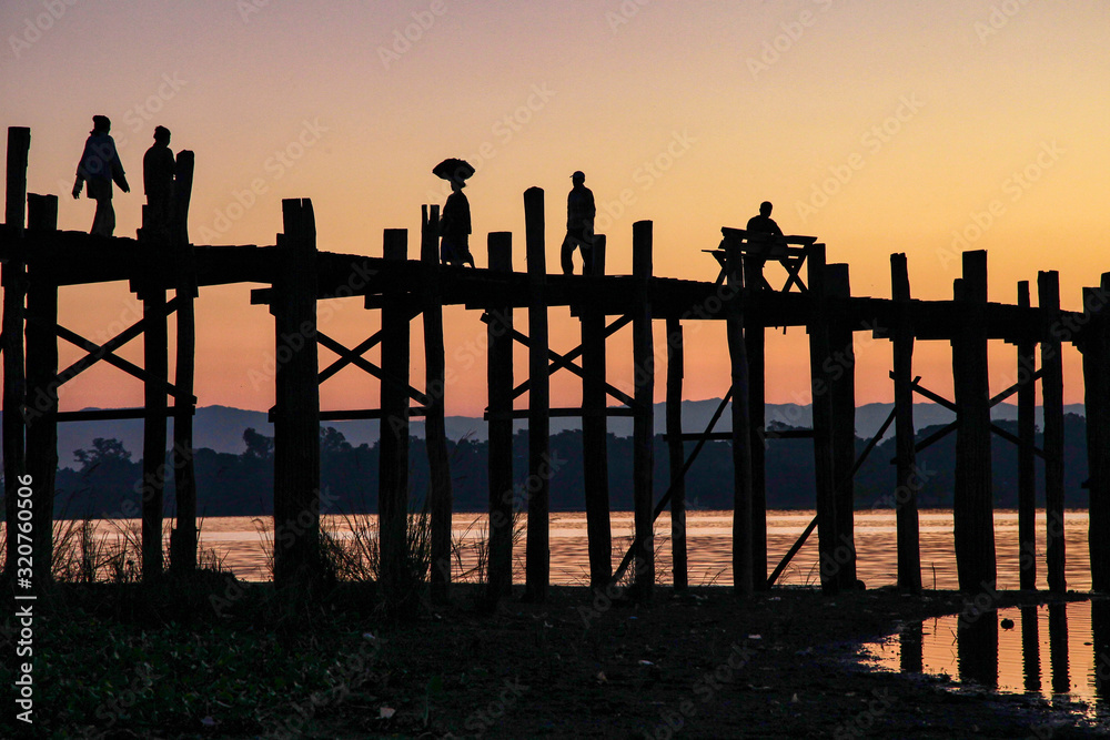 Silhouette of U Bein Bridge at sunrise near Amarapura in Myanmar former Burma Silhouette of U Bein Bridge at sunrise near Amarapura in Myanmar former Burma