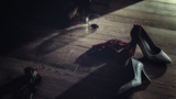 Low key photography of red wine glasses and rose with high heel and panties thrown on the floor  romantic erotic lovers night