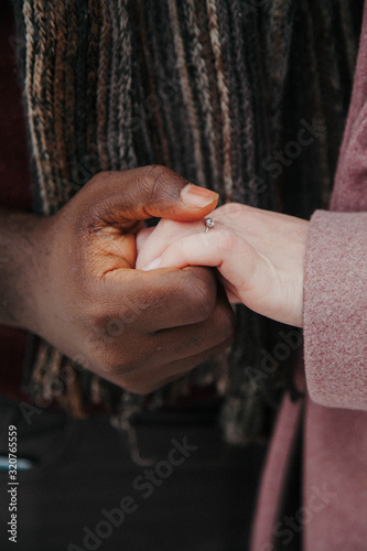 hands of a man and woman