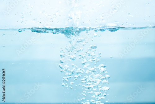 The water that is moving is a wave in a glass of water.
