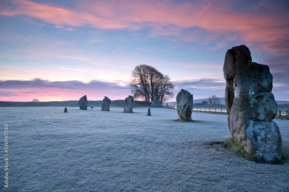 Stones at Aveburyat sunrise , England