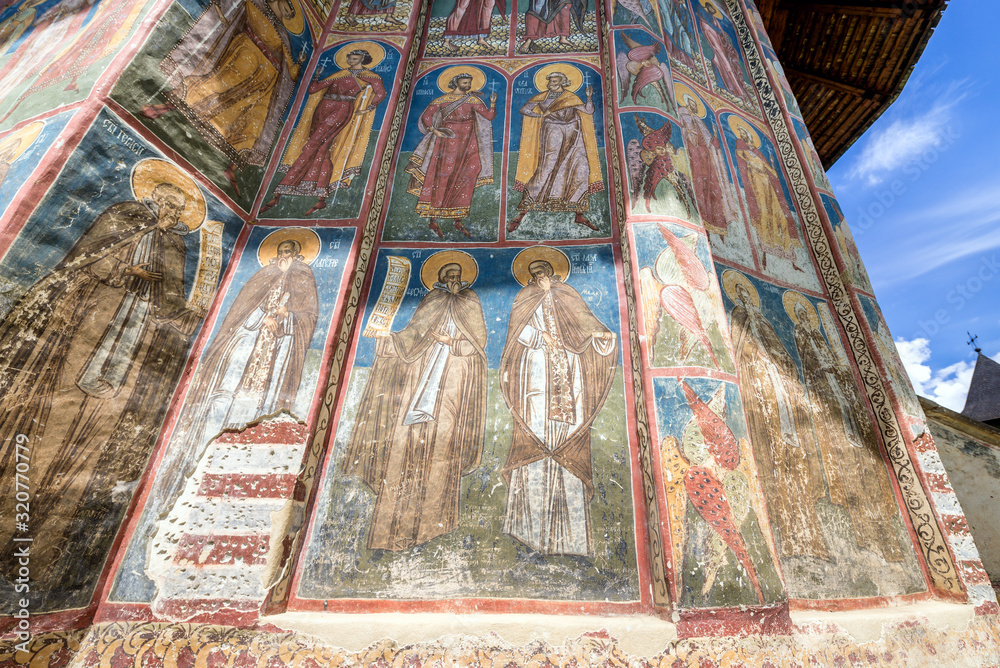 Paintings on the wall of Moldovita Ortohodox monastery church in Vatra Moldovitei, Romania