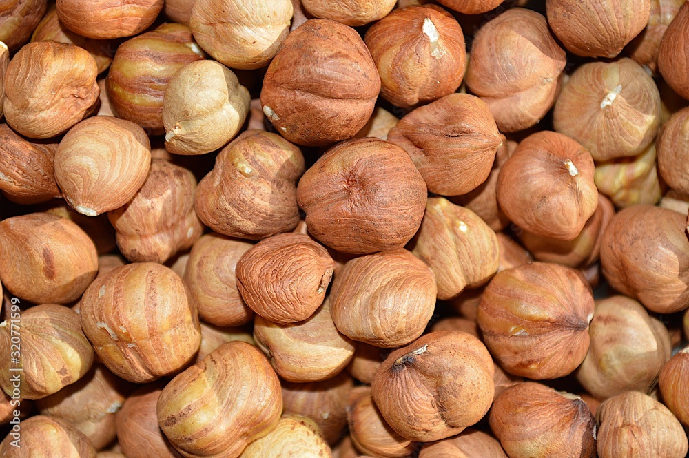 A lot of peeled appetizing hazelnuts A lot of peeled appetizing hazelnuts