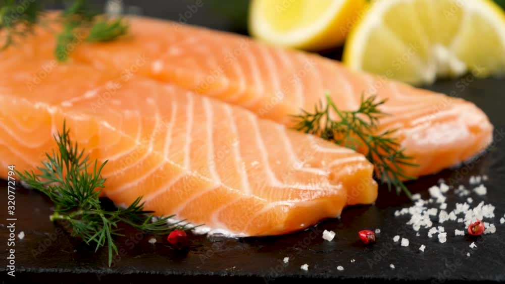 fish- raw salmon fillet with lemon and dill