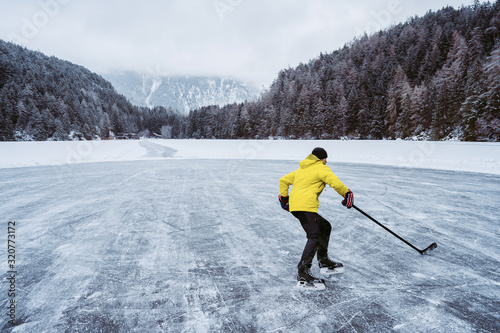 Photography Ice hockey player shoots and scores